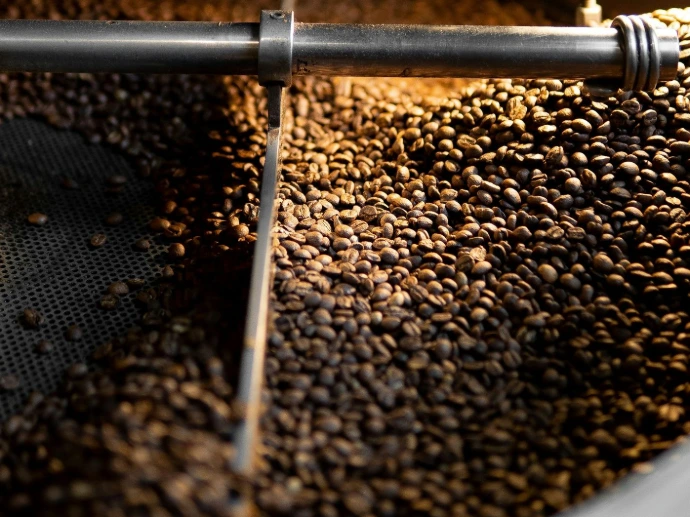 a machine that is making coffee beans